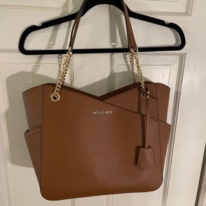 Michael Kors gold chain shoulder purse.